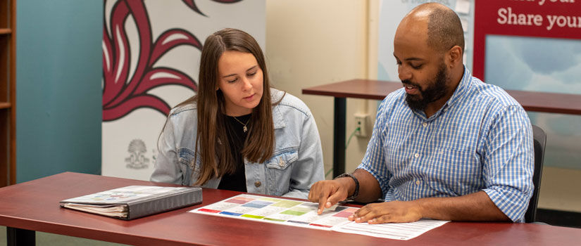 student receiving one on one advisement