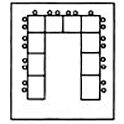 A U shape set up has tables in the shape of the letter U and chairs are placed on the outside of the U