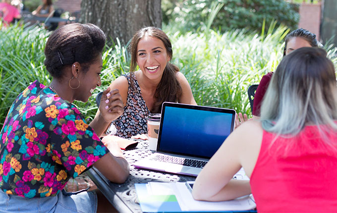 students at a table studying