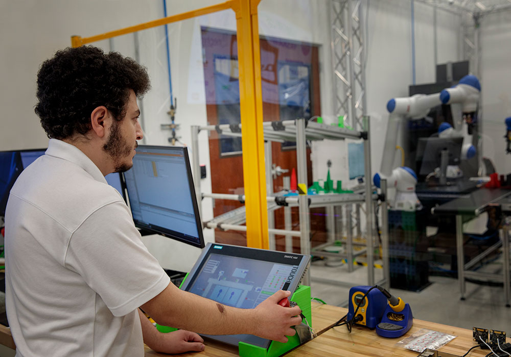 Student in an engineering lab. 