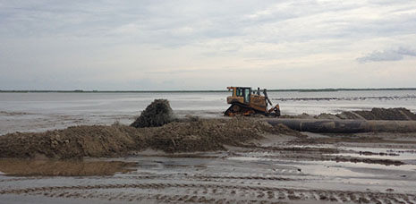 Construction equipment on the beach