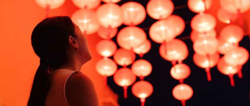 Girl looking at lanterns.