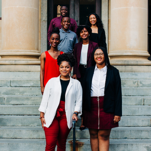 Executive leadership team for the 2021-2022 Black Honors Caucus on the steps of McKissick