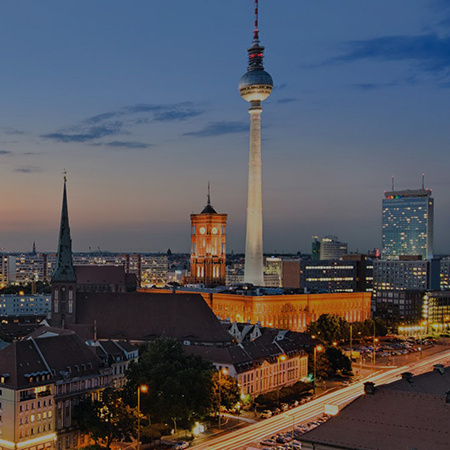 An aerial view of downtown Berlin at sunset.