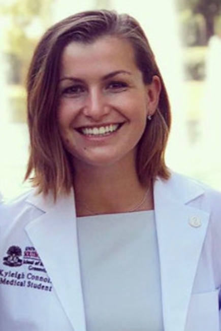 portrait of Kyleigh Connolly in white coat