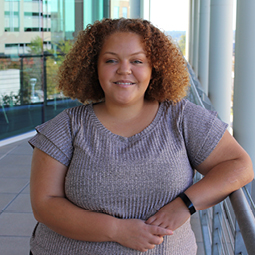 Portrait of Destiny Johnson in the Moore School courtyard