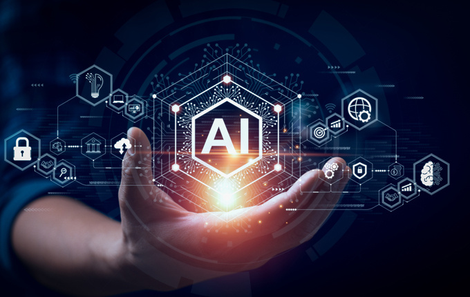 hand holding shape that reads AI; other shapes and symbols representing aspects of AI