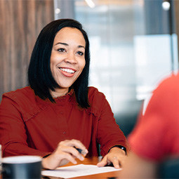 Woman sitting in a meeting