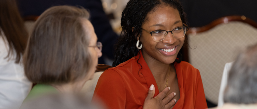 Student and scholarship donor talking
