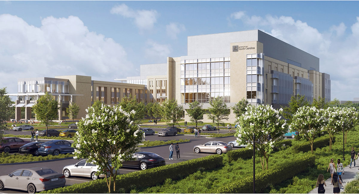 wide shot of brown building with greenery in front