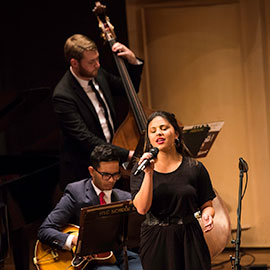 trio of music students on stage