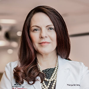  Marjorie Jenkins in classroom wearing white  coat