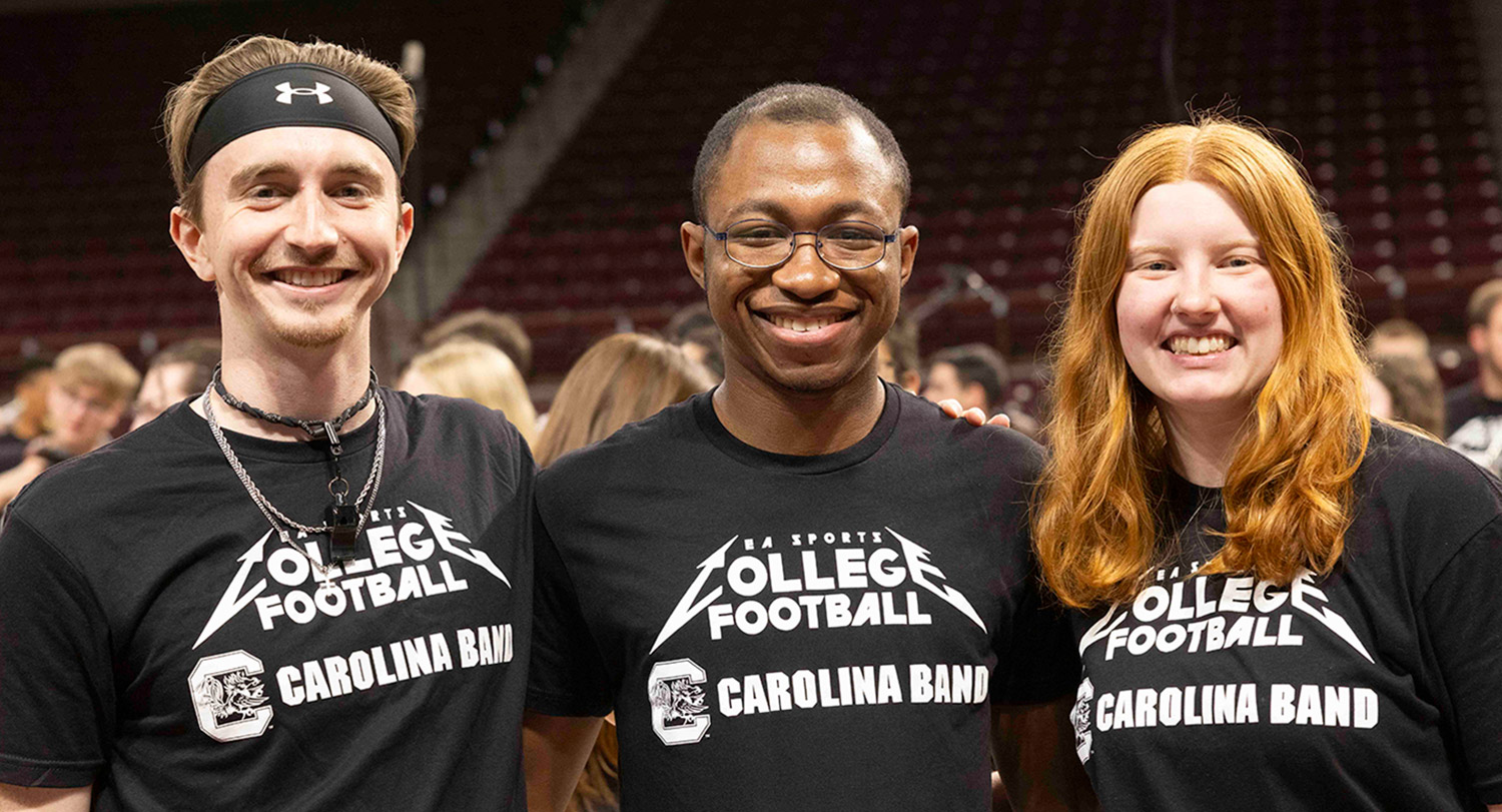Drum Major Brayden Russell with sousaphone players Jaylen Hamilton and Cathryn Sober.